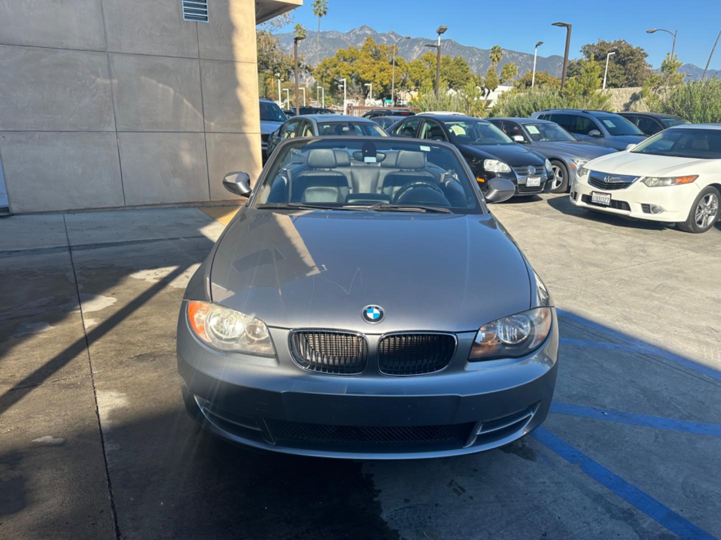 2011 Gray /Black BMW 1-Series 128i Convertible (WBAUN1C52BV) with an 3.0L L6 DOHC 24V engine, Automatic transmission, located at 30 S. Berkeley Avenue, Pasadena, CA, 91107, (626) 248-7567, 34.145447, -118.109398 - Low Miles!!! Elevate your driving experience with our 2011 BMW 1-Series 128i Convertible, now featured at our Buy Here Pay Here (BHPH) dealership in Pasadena, CA. Ideal for enthusiasts in Altadena CA, Glendale CA, Los Angeles CA, and throughout LA County, this stunning pre-owned convertible combine - Photo#12